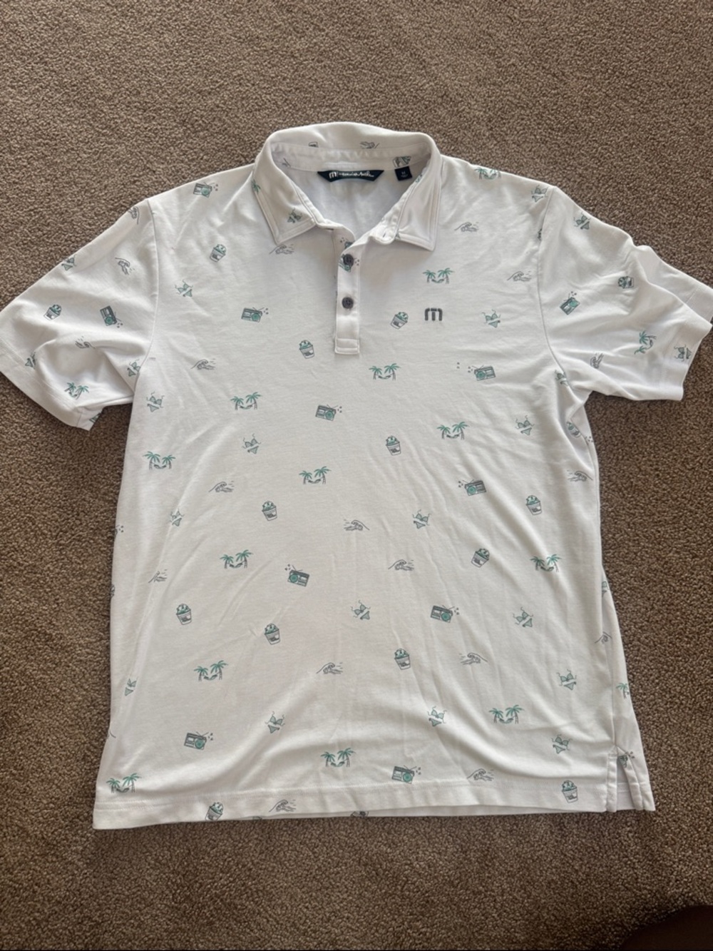 Travis Mathew White Polo with Mint Green Micro Motif